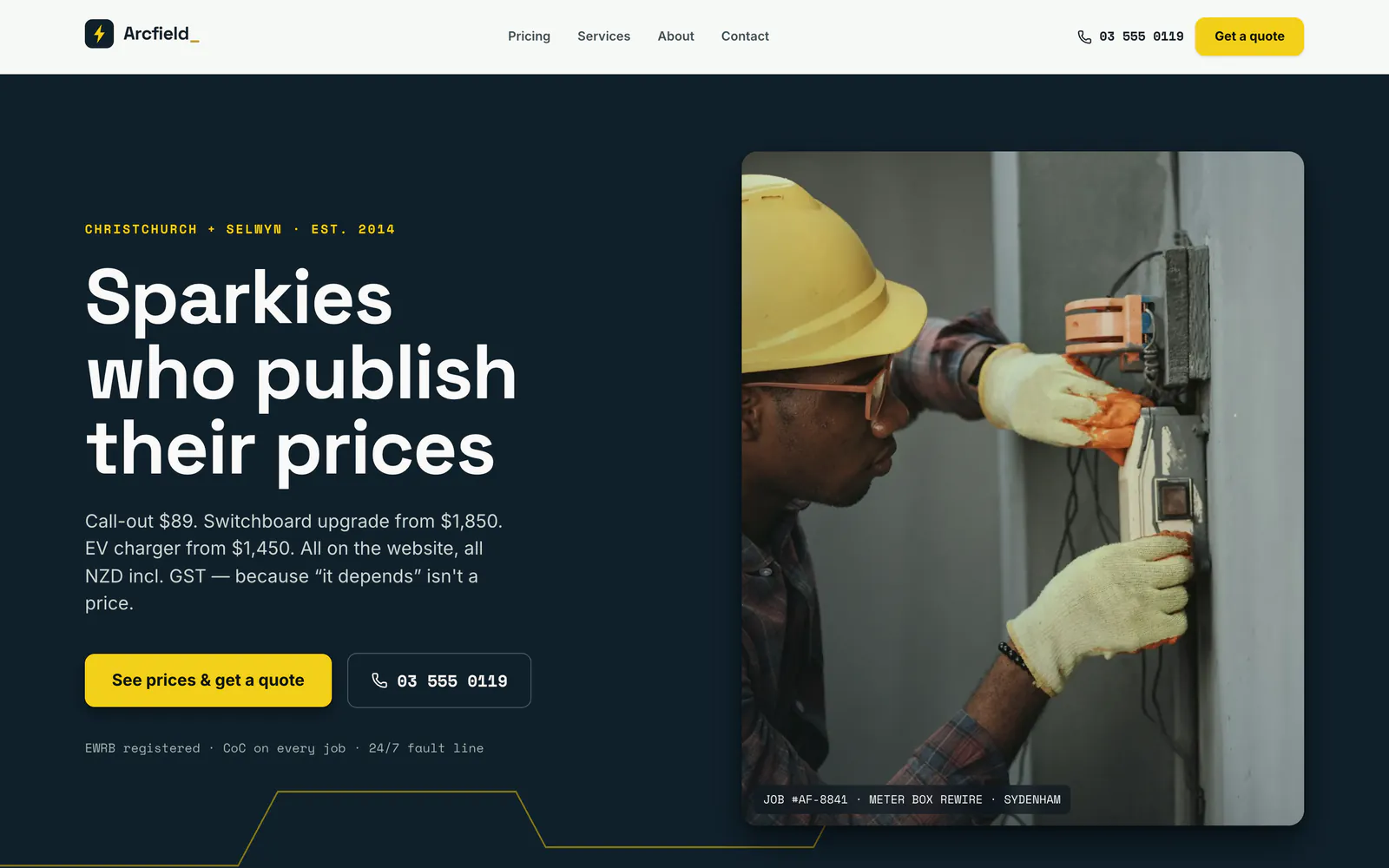 Arcfield Electrical homepage hero — a bold white headline on deep navy beside a photo of an electrician in a hard hat wiring an external meter box